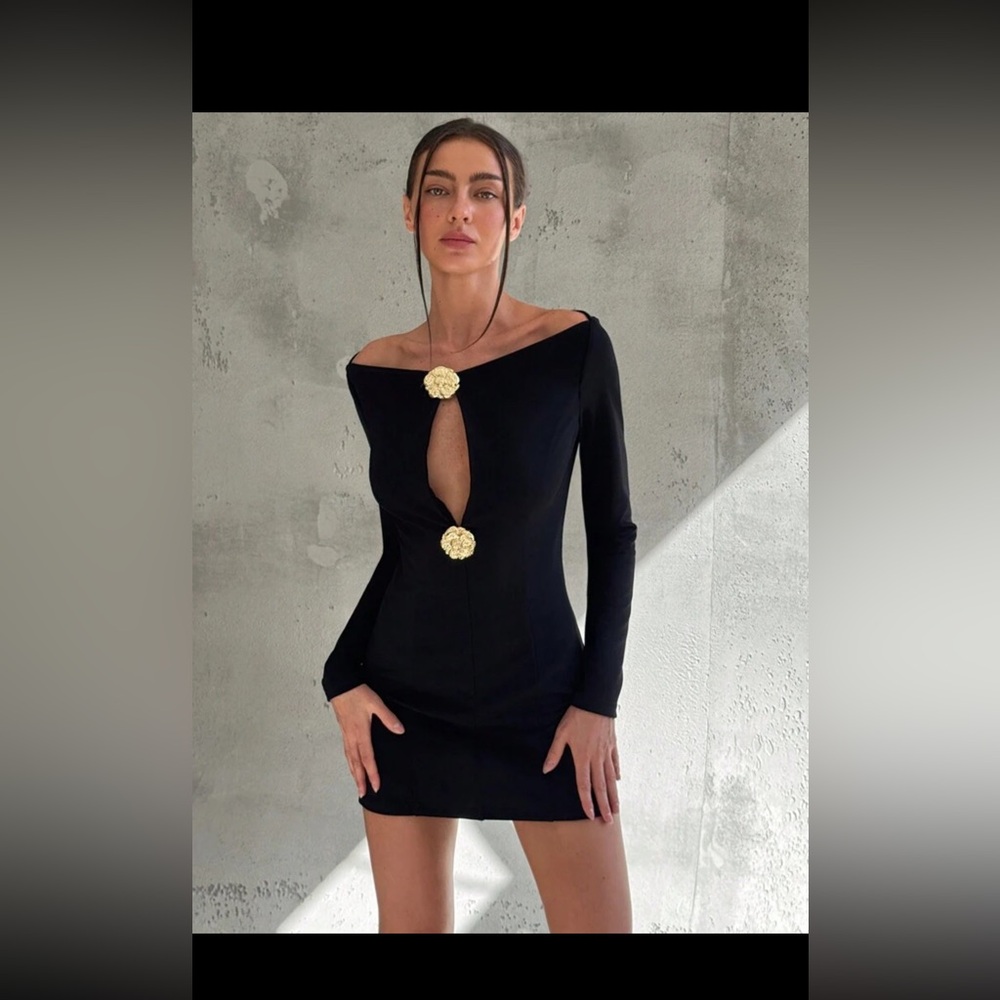Absolutely stunning black mini open cut dress